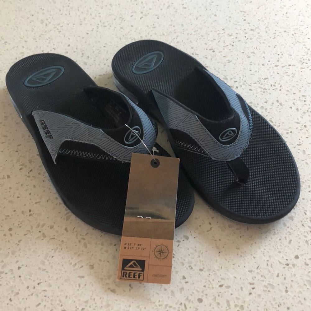 NWT Reef flip flop with bottle openers on sole!